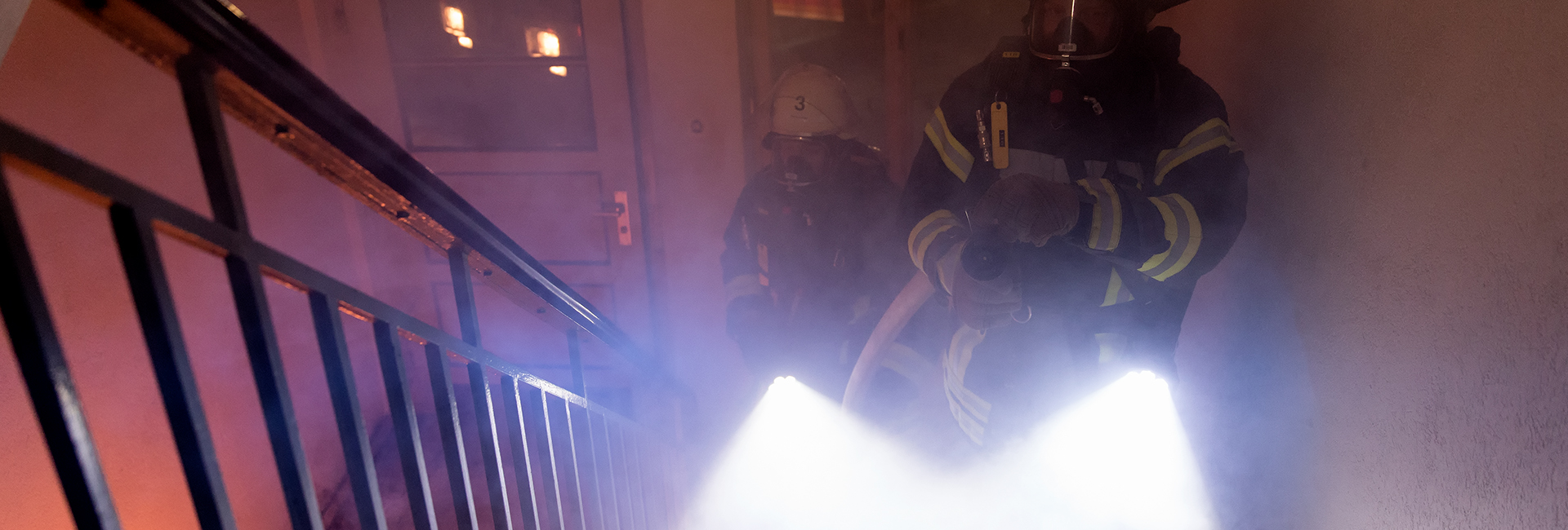 Firefighters with flashlights