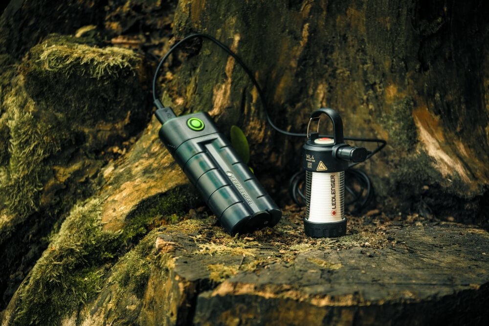 A power bank is connected to a lantern