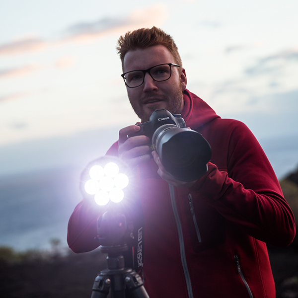 Man with a very bright flashlight Man with a very bright flashlight