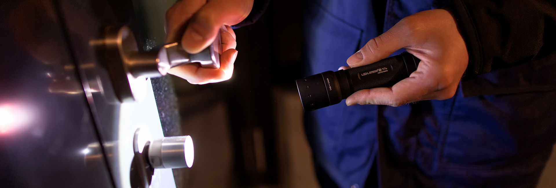 A person with a flashlight