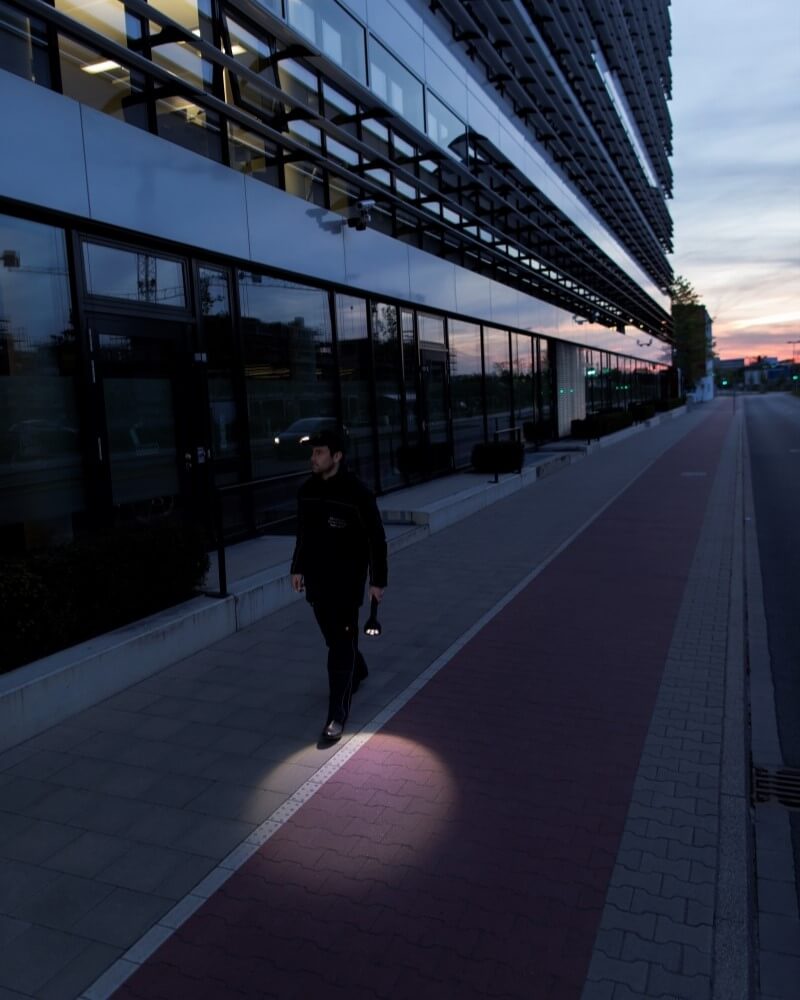 Security man with flashlight