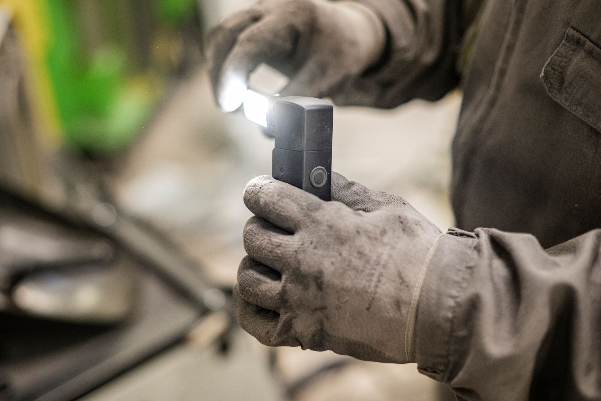 Car mechanic with a work light