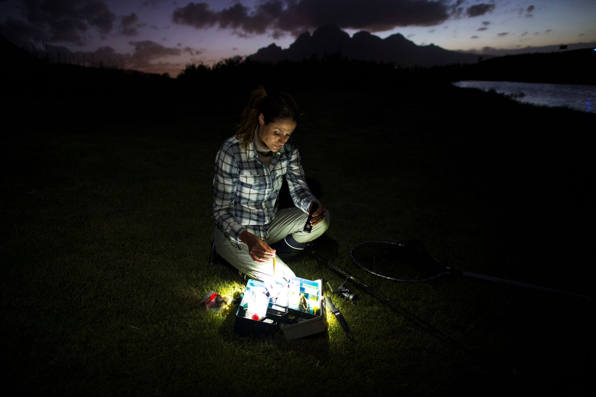 Lumens for flashlights Woman holding a bright flashlight
